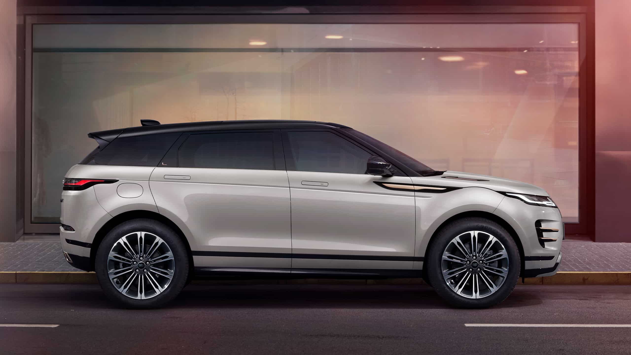 Range Rover Evoque parked near glass window