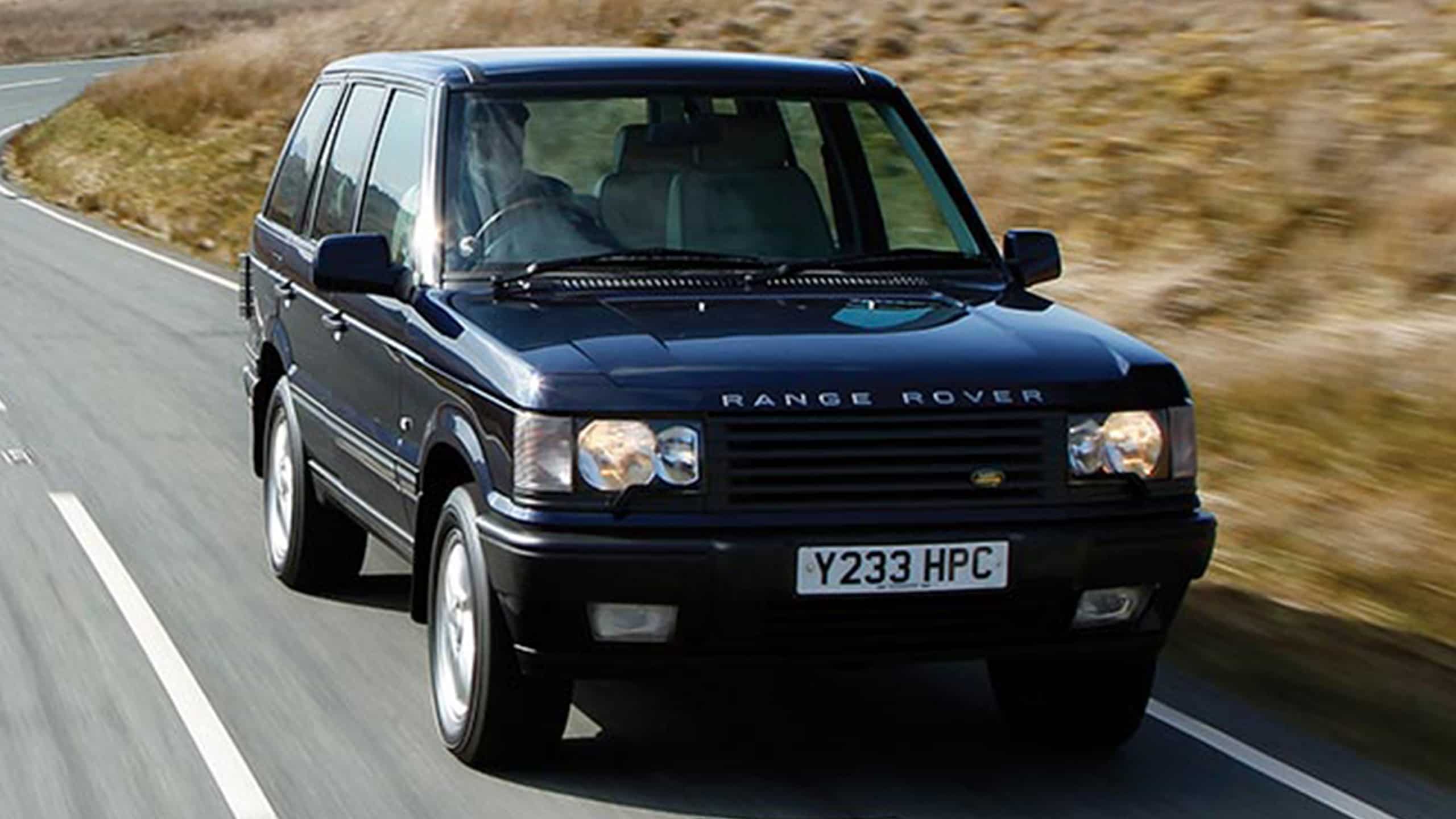 Range Rover Classic driving on road