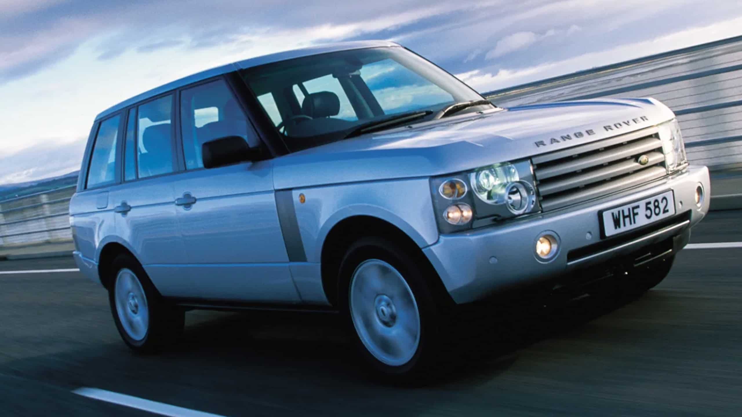 Range Rover Classic driving on road