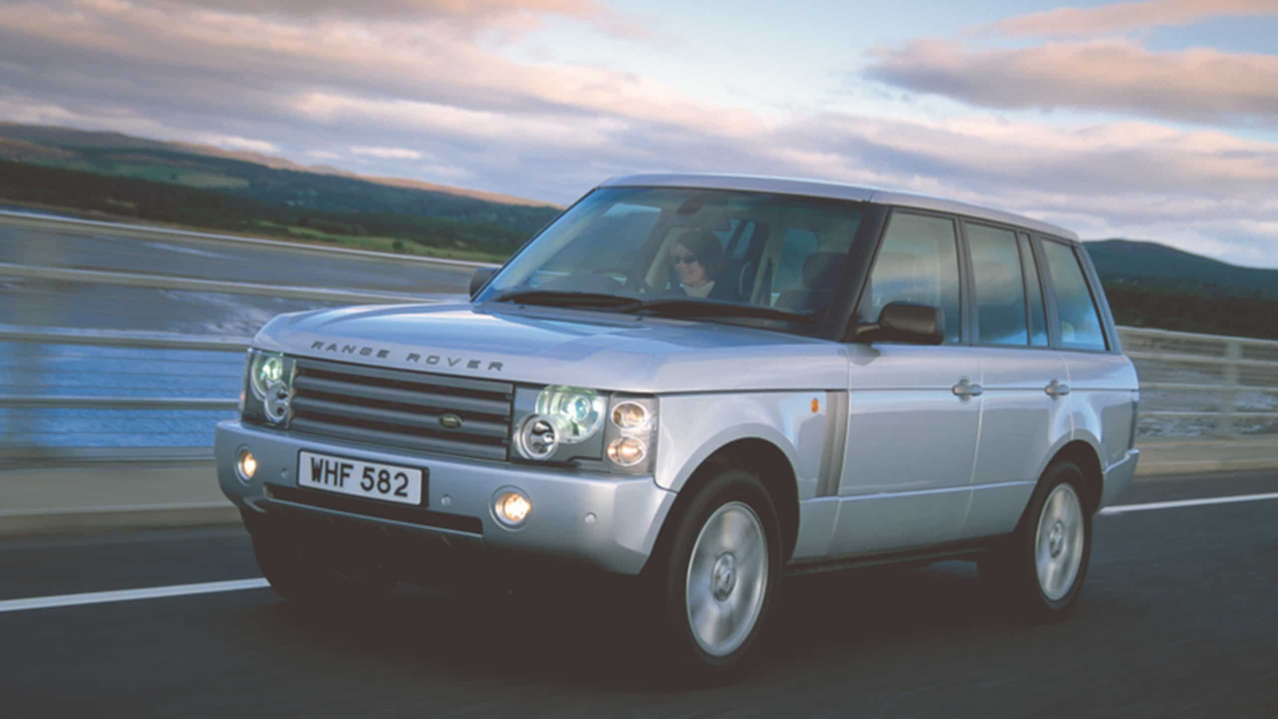 Range Rover Classic driving on road