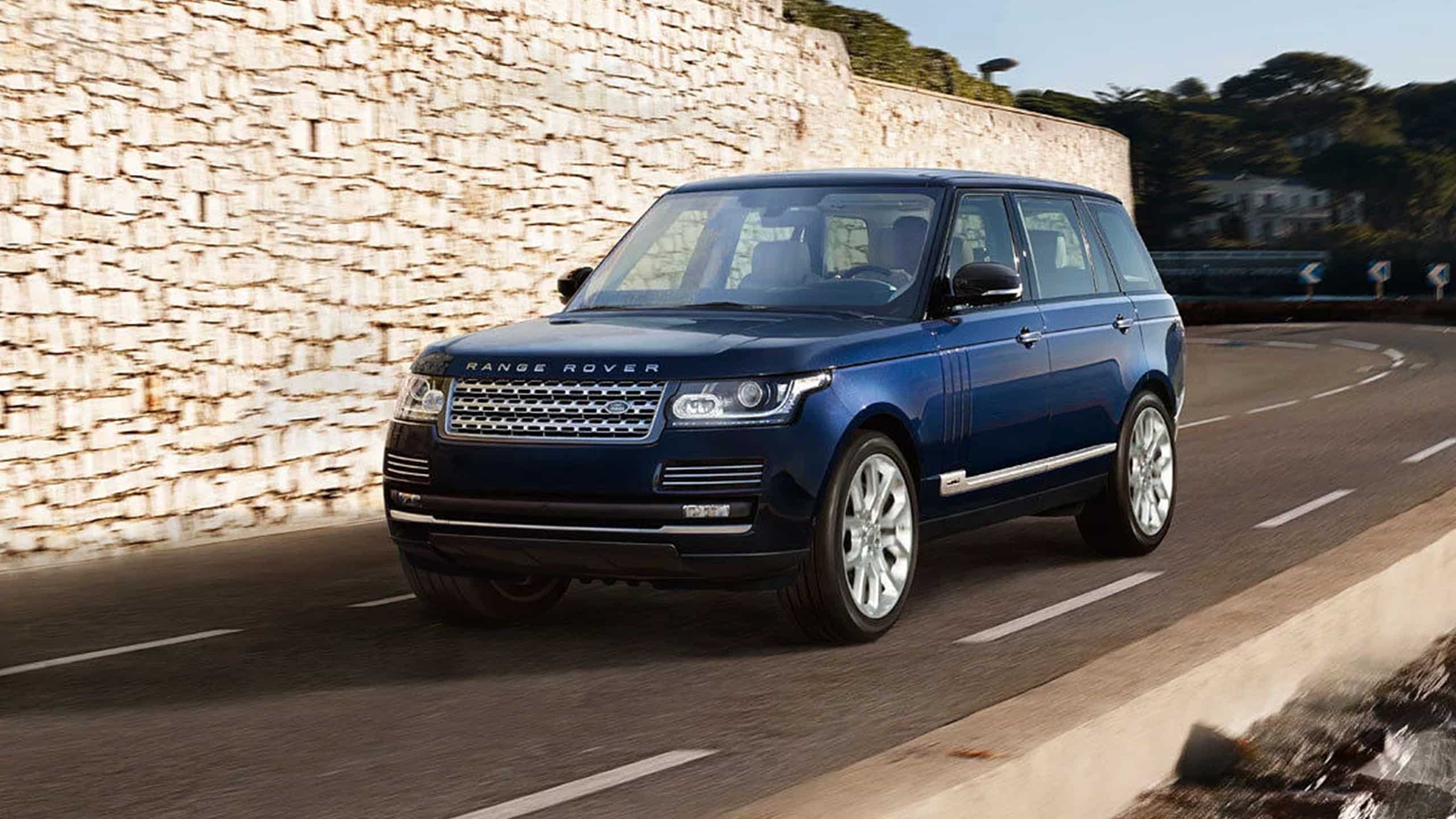 Range Rover driving on Road